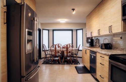 The Pas House | Four Bedrooms with Central AC