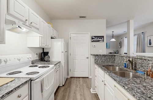 Seaside Farms Condo | Fully-furnished first-floor condo with pool & private washer/dryer- dog-friendly