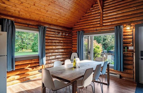 Saint-Leonard-de-Portneuf Cabin | Handcrafted Log Chalet with Hot Tub and Fire Pit