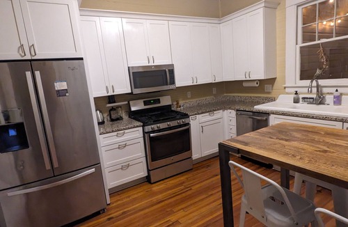 East Durham House | Inviting 2BR Sanctuary - Cozy Light Filled Bungalow with Two Screened Porches