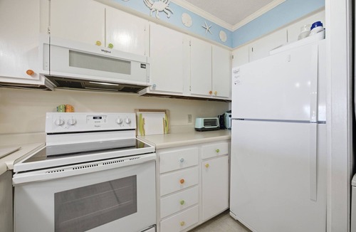 Atlantic Beach Condo | It's Beach Time at A Place at the Beach waterpark resort. This 2-bedroom, 2-bathroom condo offers fun accommodations overlooking the waterslide & pools. On-site you'll find mini-golf, tennis, beach access and SO MUCH MORE!