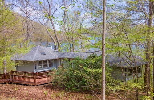 Topton Cabin | Lake Nantahala Lakefront Treehouse with private dock and hot tub.