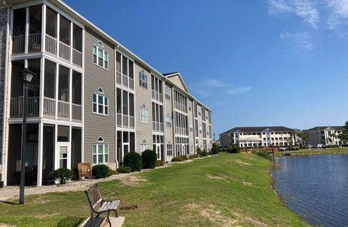 Carolina Yacht Landing Condo | Lakefront condo with private patio, pool, close to beach