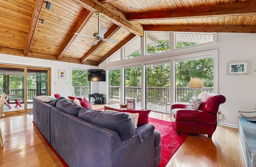 Blue Water House | Lakefront Escape with Private Docks, Three-Season Room, and Spacious Bunk Room