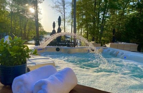 Halifax County House | Lakefront Luxury Flat Lot, Heated Pool, Hot Tub & Game Room Fun Dock!