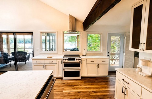 Bracey House | Lakefront with Private Dock, Hot Tub, Firepit, Kayaks, Game Room, Pet Friendly