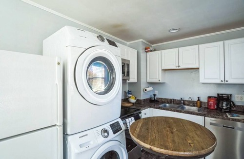 East Raleigh House | Luxury 2BD Home, Coffee, Games, Outdoor Seating, Close to Airport, Hospitals