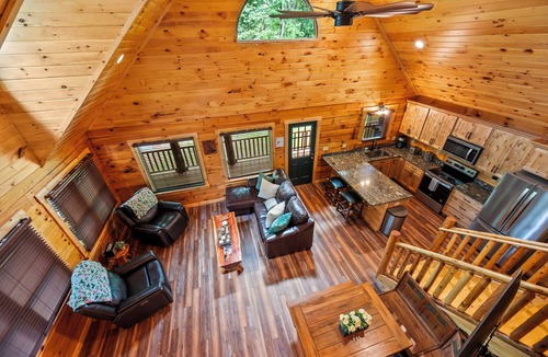 Union Hall Cabin | Main Channel Lots of Water-All Decked Out — new lakefront log home on Smith Mountain Lake with a private hot tub, 50+ ft of wraparound deck, fire pit patio & easy lake access. Two full kitchens. One of 5 cabins on an 8-acre lakefront micro-resort.