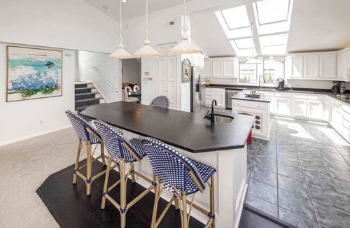Croatan Beach House | Ocean-view home that is within a 2 minute walk to the beach w/rooftop deck