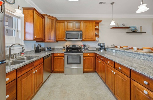 Rodanthe House | Oceanfront Condo with Private Sundeck, Resort Pool, Elevator, and Beach Access