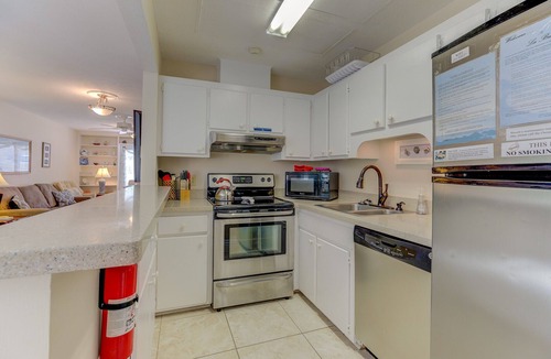 Golden Mile House | Oceanfront duplex with pool spa putting green walkway to beach