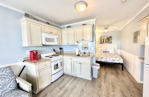 Atlantic Beach Condo | OCEANSIDE COMMUNITY 2nd Floor Private Beach Access Pool Kitchen BBQ Grills