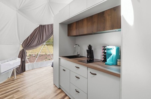 Mineral Apartment | One of kind wellness/glamping experience with wellness amenities, covered outdoor dining, a complete live fire cooking setup, and a clear star gazing top.