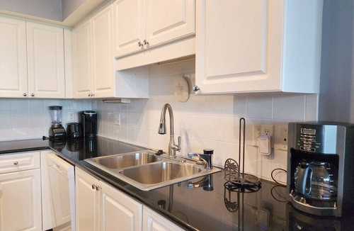 Litchfield by the Sea Condo | Paget 403 Features Oceanside Views of Pool & Clubhouse