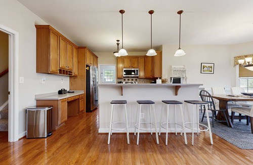 Livingston House | Peaceful lakeside retreat with hot tub, private pool, dock & paddle boards