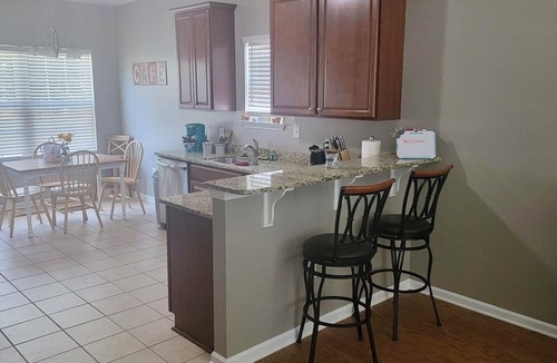 Little River House | Pet friendly 2 bed 2 bath home near golfing and walking distance to many places.