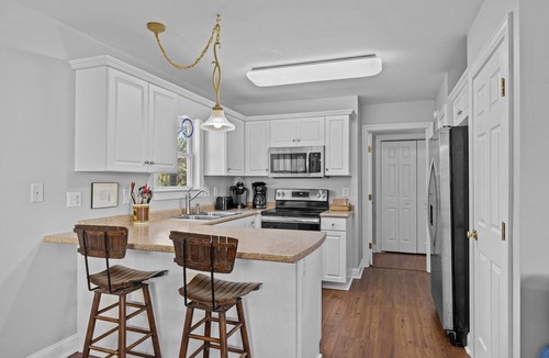 Emerald Isle House | Pet Friendly, Oceanside Interior Home Private Pool, Golf Cart, and Easy Access.
