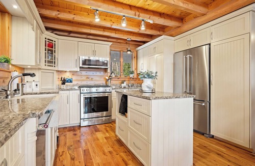 Island Falls House | Pleasant View Luxury Off-Grid Estate with Hot Tub, Gym & Direct ATV Access
