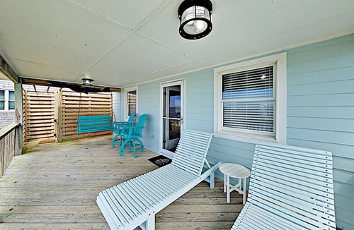 Ocracoke House | Point Of View: Relax on the deck watching passing boats and kayaks.