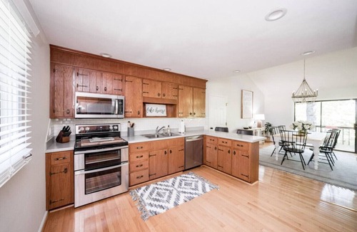 North Shore House | Private Cove + Dock, Kayaks, Paddleboards, Fire Pit, Pet-Friendly Lake Escape