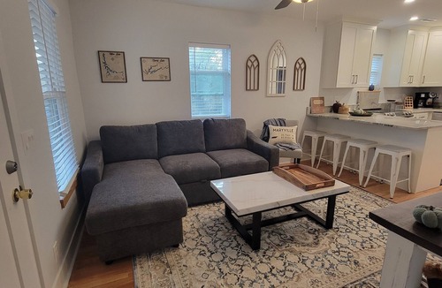 Maryville House | Pristine creekside home in peaceful Maryville with sprawling yard and deck.