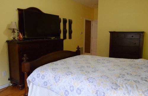 Lake Carolina House | Quiet brick home near walking paths, town center, and a lakeside activities.