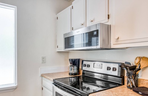 Royal Pines House | Recently renovated home in quiet location with decks, WiFi, fireplace, AC, & W/D