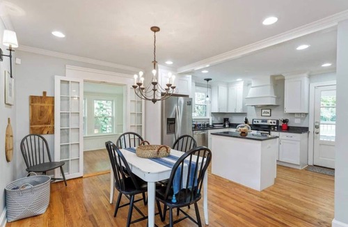 Bluefields House | Relax with the whole family at this peaceful cottage 6 miles to downtown , Opryland and other great attractions in Nashville. This home sleeps 10 comfortably it has 4 bedrooms 3 full bathrooms. Outdoor patio with a bar, hot tub, fire pit and yard