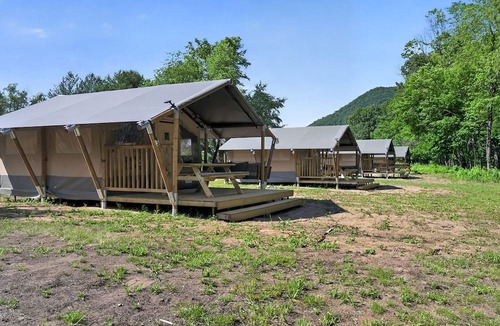 New River RV Rental | Safari Tent Retreat with Riverfront Deck and Nature Stay in Blacksburg, Virginia