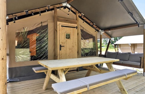 New River RV Rental | Safari Tent Retreat with Riverfront Deck and Nature Stay in Blacksburg, Virginia