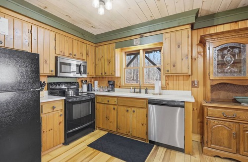 Zionville Cabin | Secluded Forest Cabin with Cozy Porch w/Hot Tub!