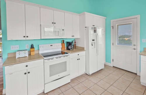 Wind Over Waves House | Semi-Soundfront Home w/Private Pool, Hot Tub, Game Room, & Community Boat Ramp