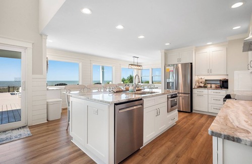 Caswell Beach House | Serenity by the Sea: Nostalgic Oceanfront Home with Room for the Whole Family