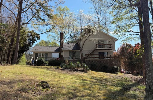 Manson House | Spacious 4-bedroom lake house in delightful Manson with AC/rec room/dock