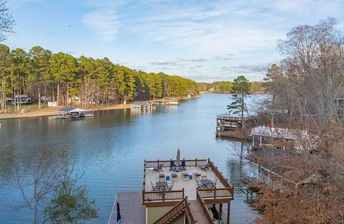 Littleton House | Spacious 6BR house w/dock, kayaks, fire pit, and close to amenities. Sleeps 16.