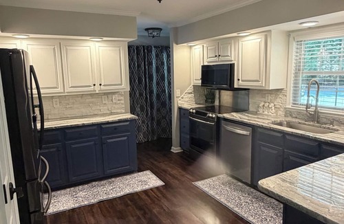 Henrico House | Stunning Lake Gaston waterfront! Renovated 3BR 2BA with dock on an acre lot.