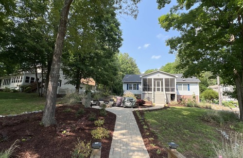 Henrico House | Stunning Lake Gaston waterfront! Renovated 3BR 2BA with dock on an acre lot.