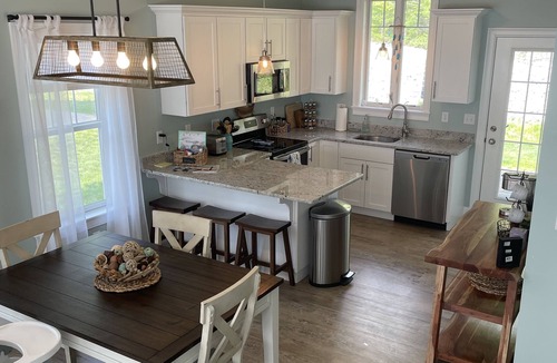 Arundel Cottage | Sunkissed cottage, heated pools, club house, game room, 15 mins to local beaches