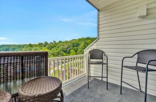 North Shore House | Sunset Landing - Waterfront condo with lake-view deck, tennis court & pool