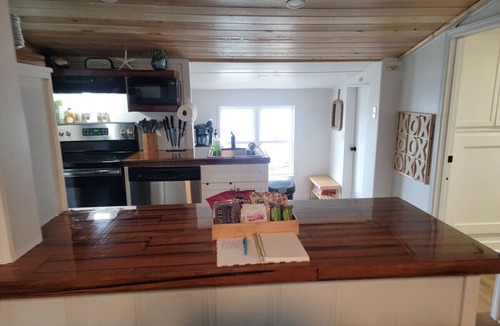 Cedar Point House | Two waterfront homes with endless adventure, hottub, kayaks, two jonboats, fishing, and three miles to beach