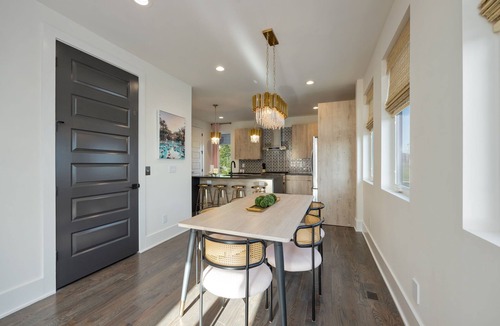 Katie Hill Neighborhood House | Ultra Heated Rooftop Pool! Arcade, Elevator, EV Charger, Sleeps 12, Full Home