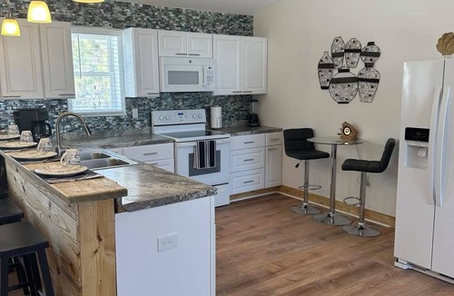 Colington Apartment | Unique 2-bedroom upstairs unit, just 13 miles to Outer Banks. Close to shopping!