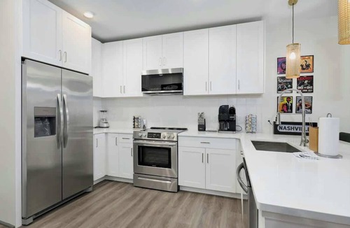 Rolling Mill Hill Condo | Upscale 4th-floor condo near top attractions with fast WiFi & rooftop lounge