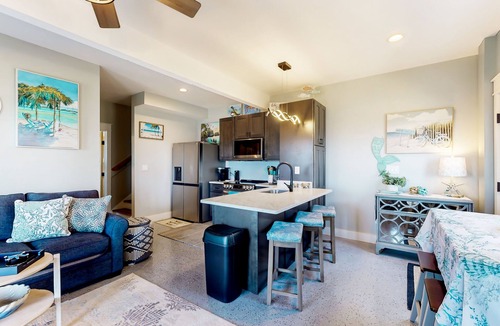 Colington Harbour Apartment | Waterfront apartment with lovely bay views, outdoor shower & fishing access