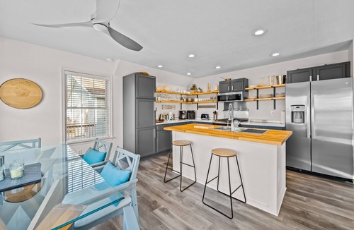Colington Harbour House | Waterfront home and Oasis with private dock, outdoor bar and firepit