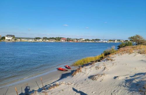 Cedar Point House | Waterfront home with Private Dock Hot tub and swimming as well as a large fenced backyard