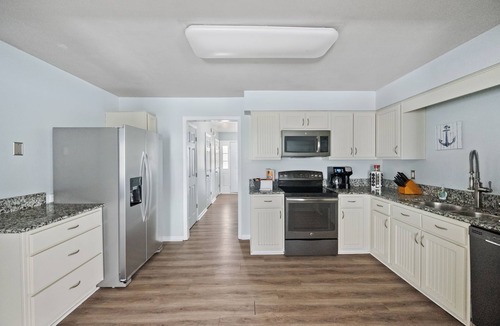 Cottage Line House | Welcome to the Captain's Quarters, a 4 BR luxury furnished monthly rental.