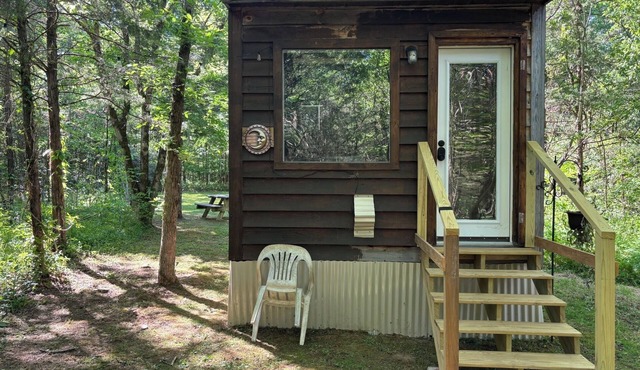 A private tiny guest house tucked away on a quiet piece of country property.
