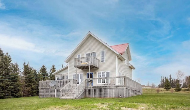 Beach Hill Cottage—Waterview PEI Retreat with Wraparound Deck & Family-Friendly