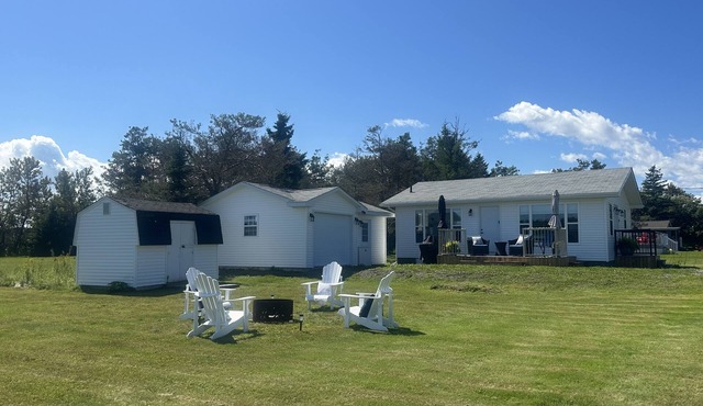Beautiful waterfront cottage on large property. Walking distance to Parlee Beach